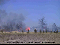 2003-05-18 - Incendie de bâtiment (Garage) et de broussaille - Entraide à Landrienne